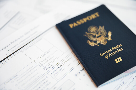 Passport with folder and documents prepared for a safe trip to Tijuana to buy medication.