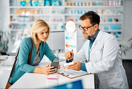 Is it safe to go to Tijuana illustration showing a symbolic safe journey with glowing footsteps leading to a pharmacy building.