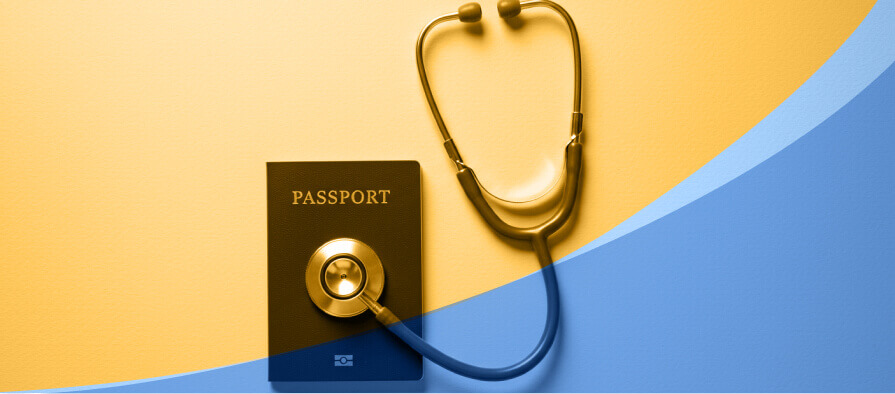 Stethoscope next to a passport on neutral background, symbolizing medical tourism.