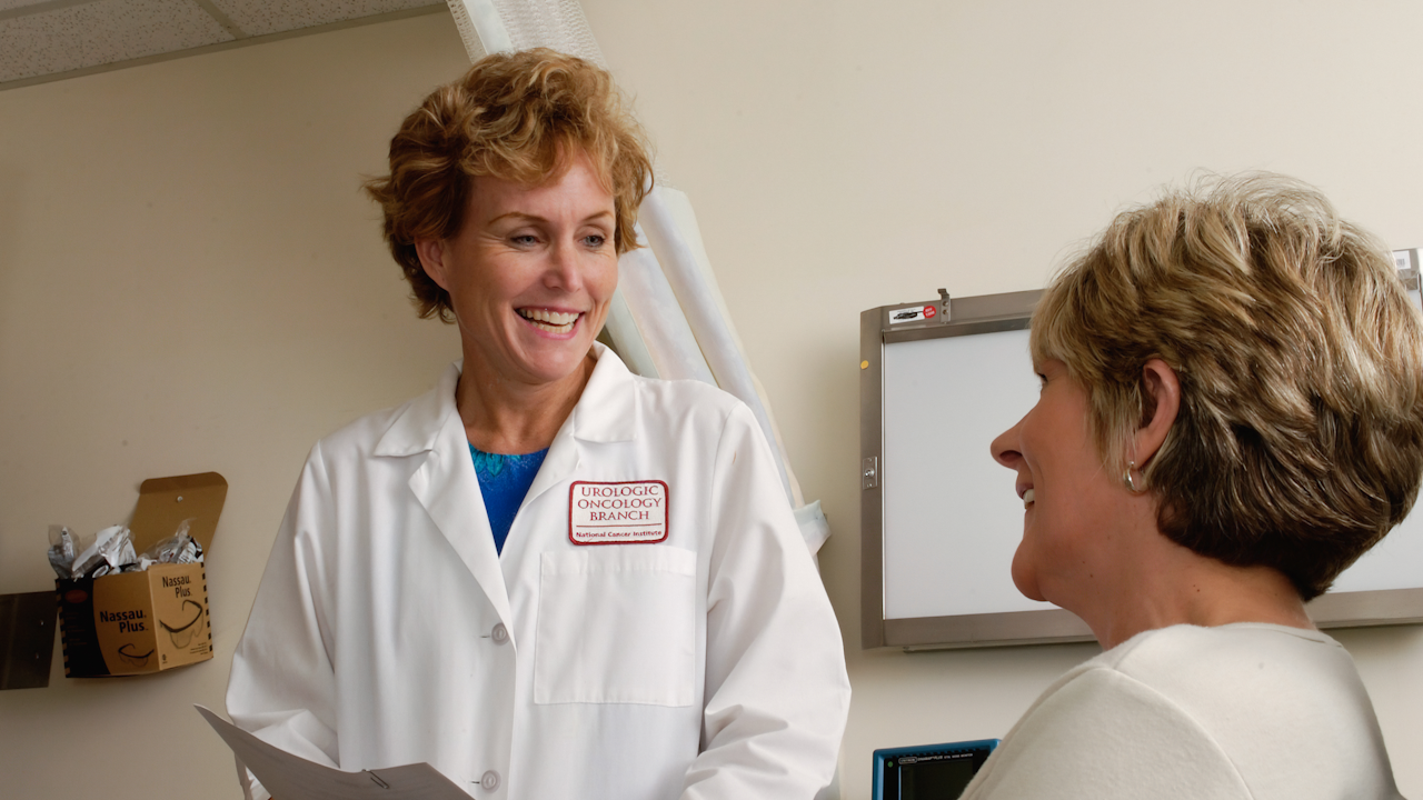 A patient and clinician discussing Skyrizi vs Stelara treatment options together